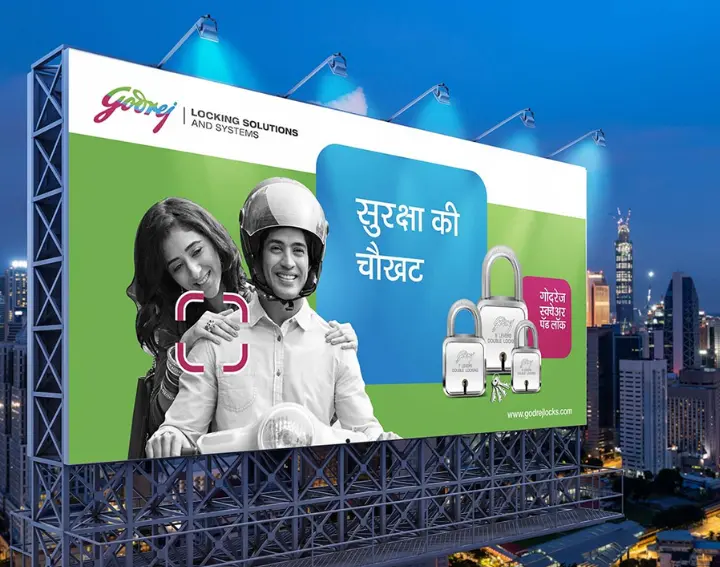 High-visibility billboard placed at a traffic-heavy junction in Pune city.